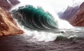 650-foot mega-tsunami is captured by satellites and sends seismic waves around the world for nine days