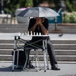 Climate change may be making us lonelier. How heat waves and extreme weather disrupt social connections